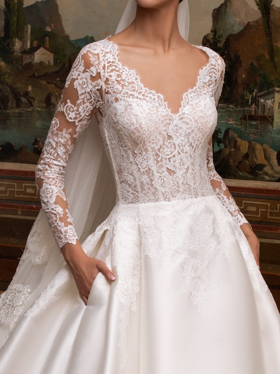 Princess wedding gown with lace sleeves & mikado skirt