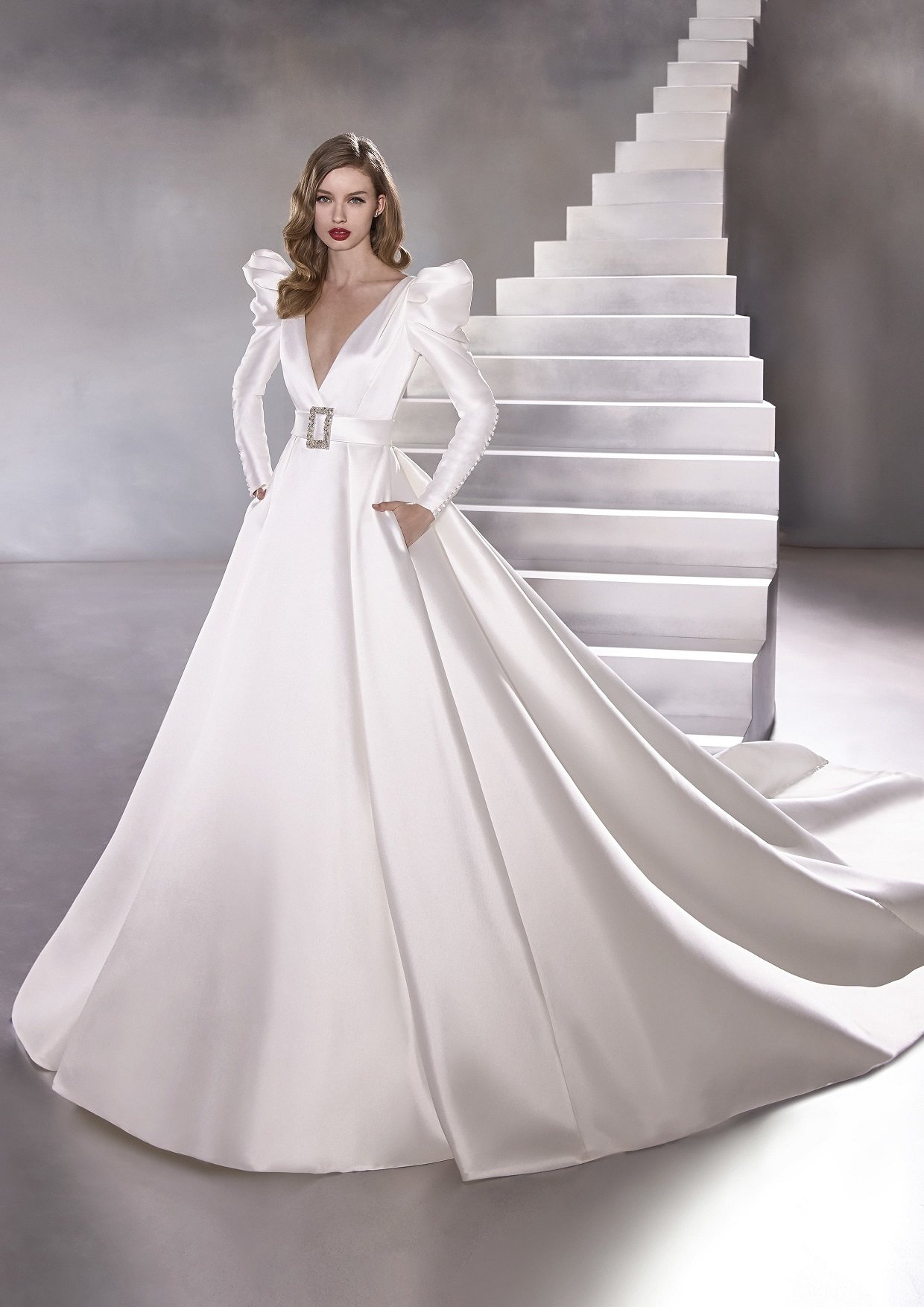 Dramatic puffed shoulders princess wedding gown Modes Bridal Nz